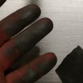 Polished zinc, dirty hand