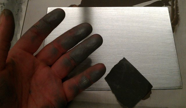 Polished zinc, dirty hand